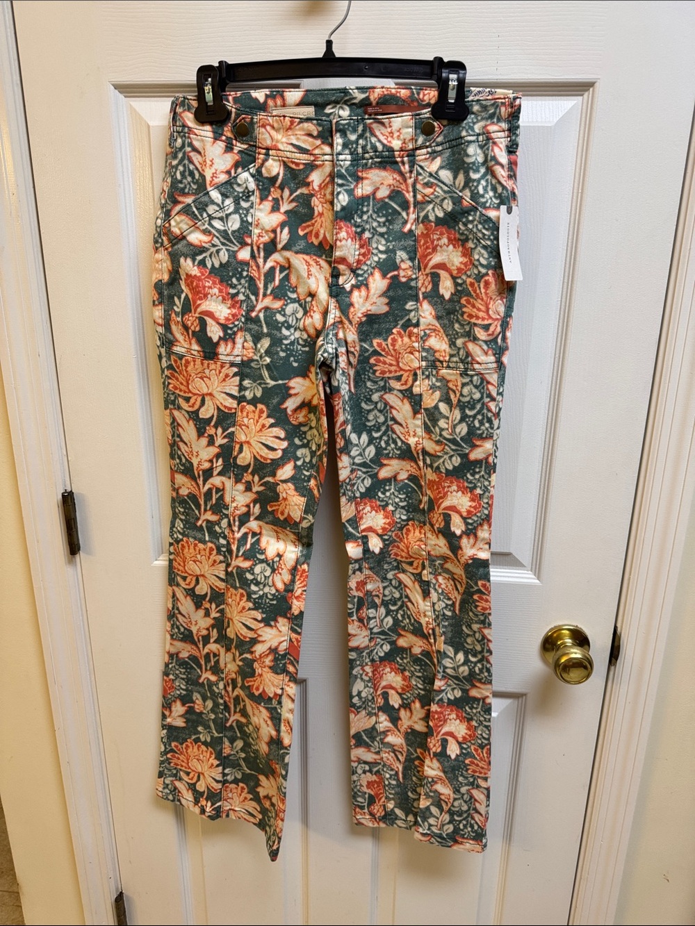 Anthropologie Pilcro Floral Boot Cut Pants in Green and Coral